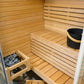 Sauna angolare Sirius con secchio e pietre.