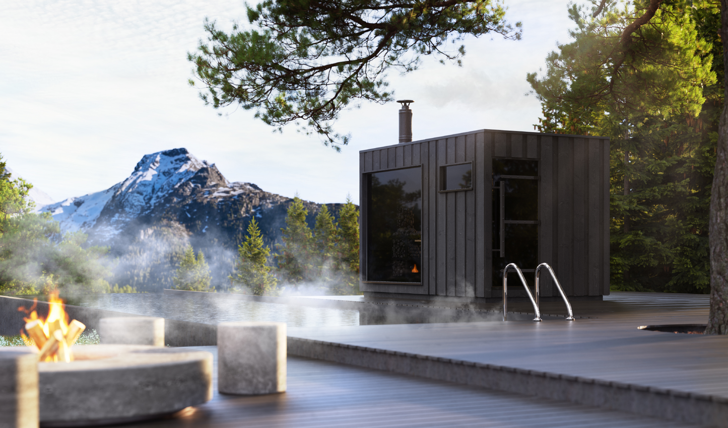 Sauna Legend con finestra panoramica e vista sulle montagne.