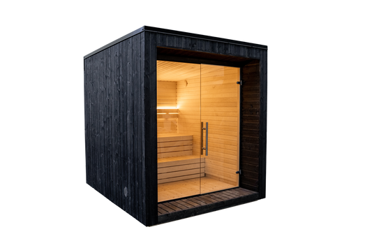 Sauna LUMI con porta in vetro e design nordico minimalista.