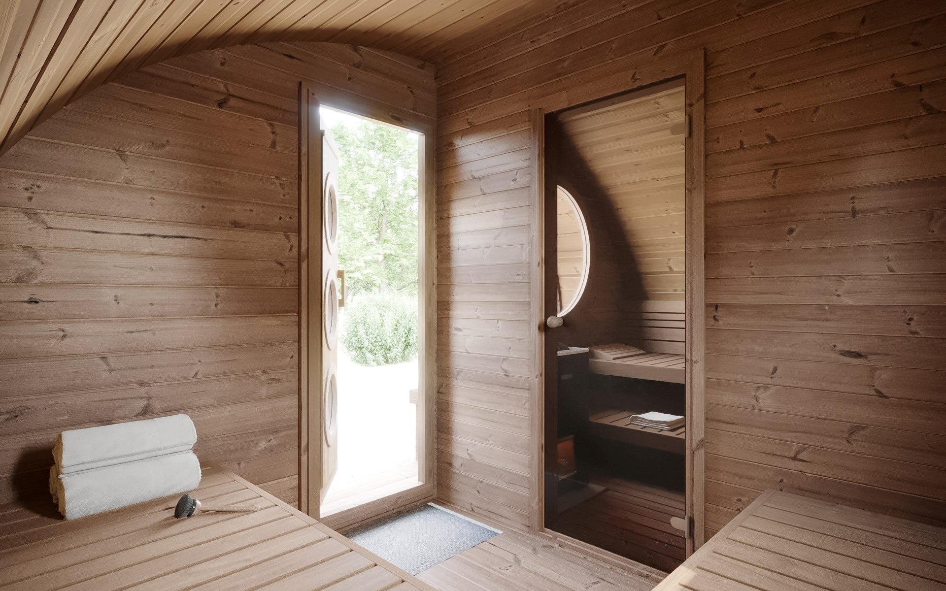 Saunamo Sauna esterna Hobbit 300 con porta e finestra aperta.